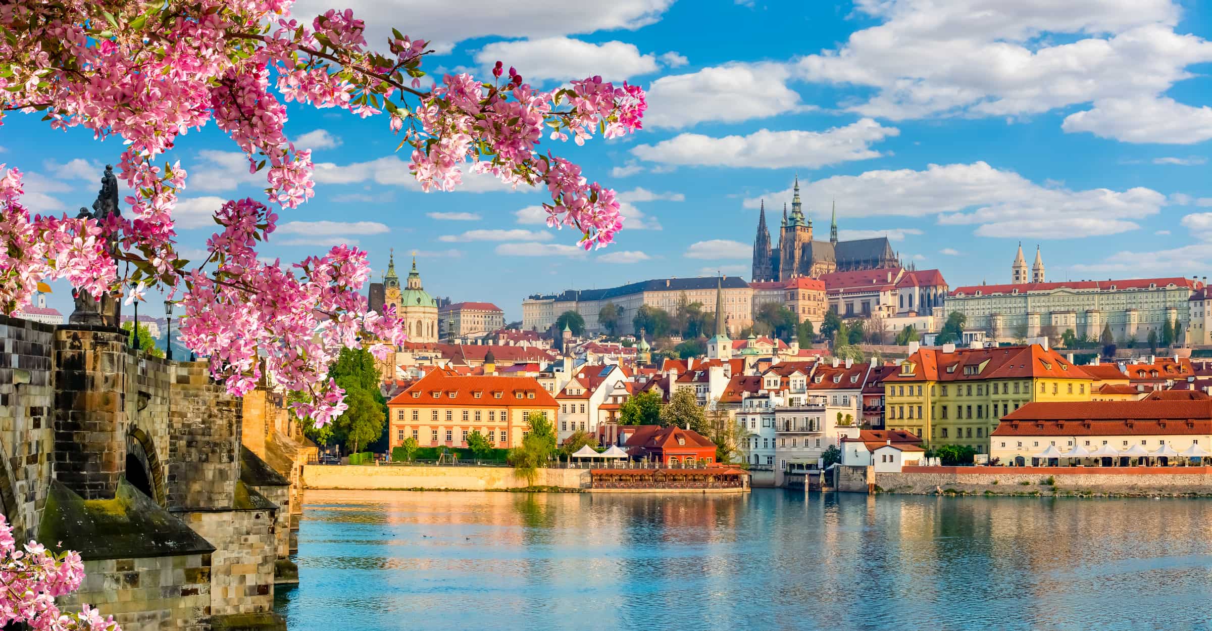 Scenic Prague panorama with Hradcany castle and Vltava river in spring, Czech Republic